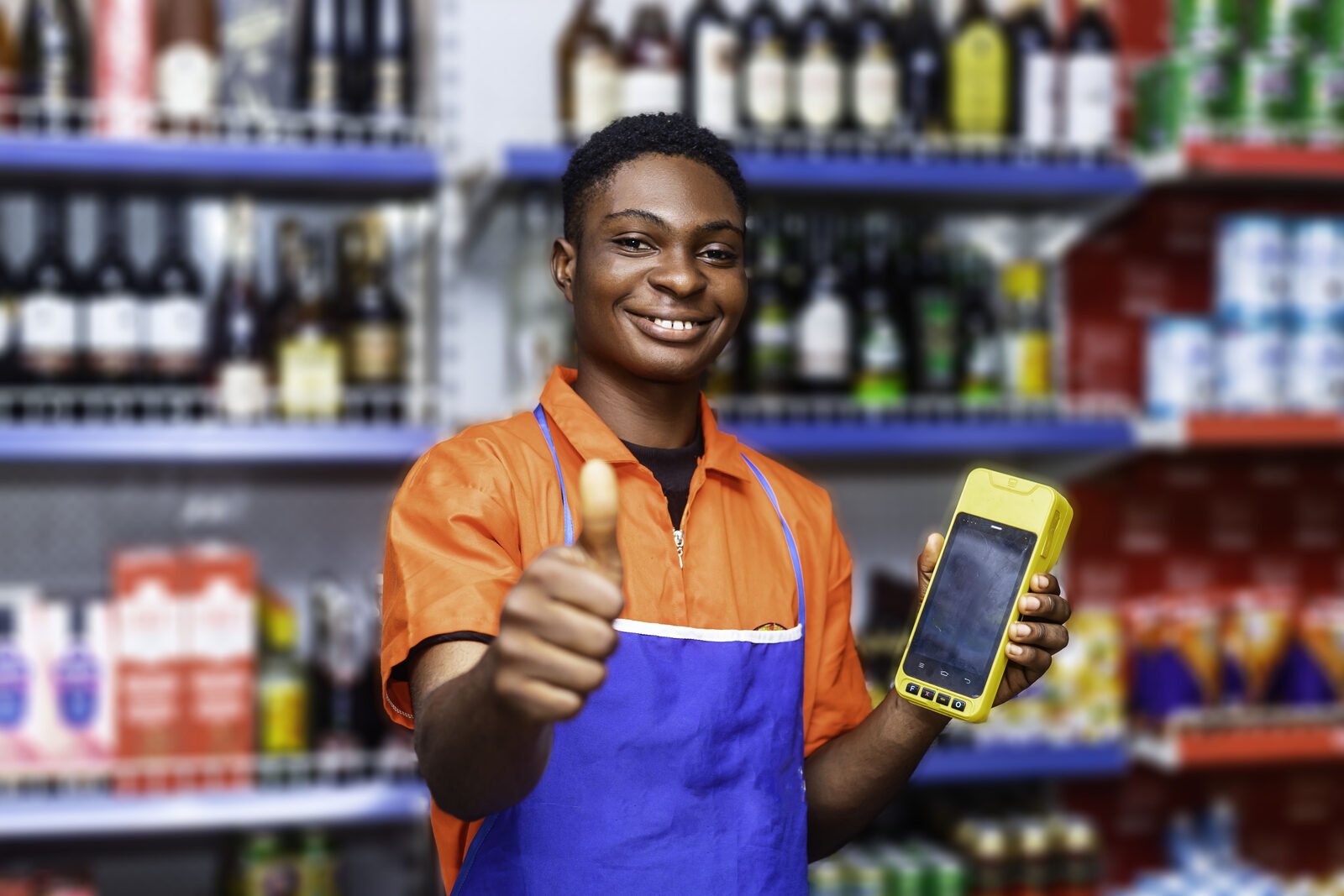 Shop attendant using a Wakatii terminal